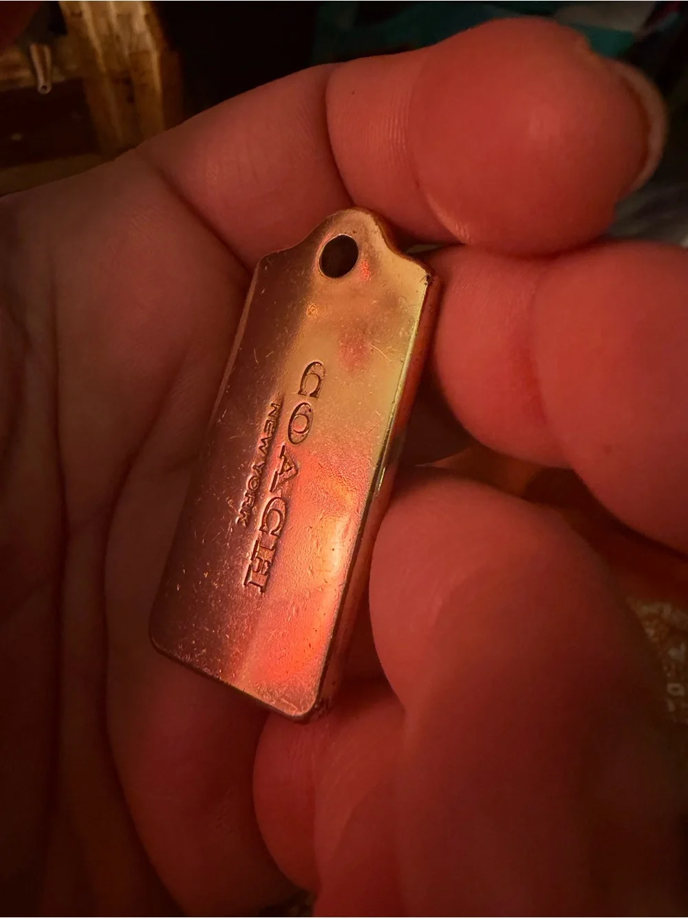 Coach Gold Tone Rectangular Logo Tag
